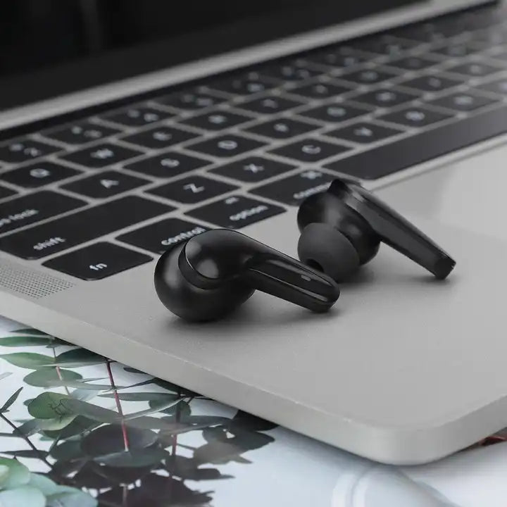 audífonos vq-bh20 sobre laptop