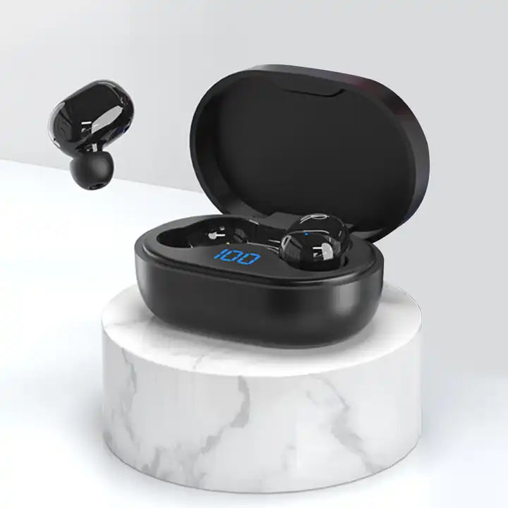 Audífonos Bluetooth color negro con panel LED VQ-BH25 sobre marmol