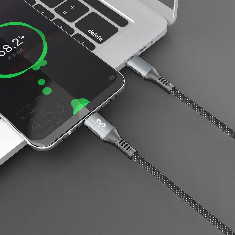 Cable PD conectado a Mac y iPhone